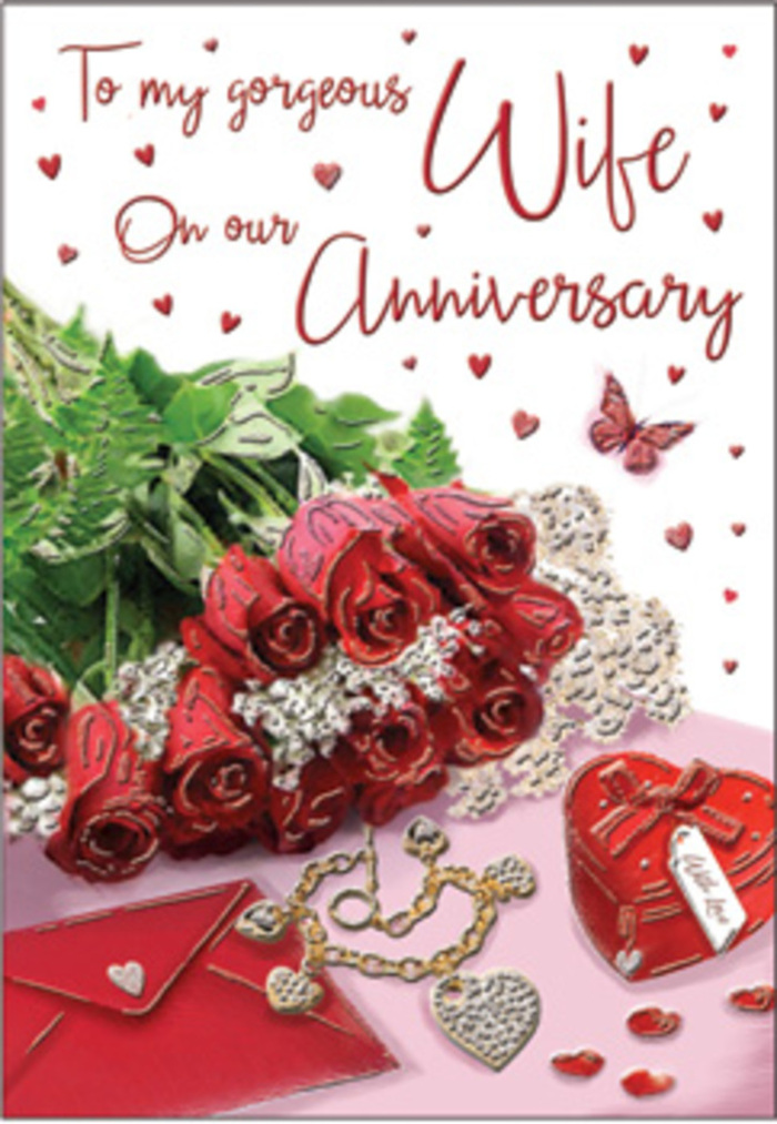 A deeply emotive anniversary card scene unfolds with the richness of a cherished memory, arranged with the kind of care an experienced Friern Barnet florist brings to a special order. At its heart stands a classic bouquet of red roses, each bloom fully open and luxuriously rounded, petals overlapping in velvety spirals that transition from soft scarlet at the rims to a deeper, almost wine-red tone within. The flowers are gathered together and elegantly wrapped, their stems cradled by abundant green foliage that introduces a natural, garden-fresh contrast, reminiscent of a stroll through Friary Park on a calm afternoon. Surrounding the bouquet are finely observed details that suggest years of shared occasions: a delicate lace motif seems to edge part of the design, its pattern subtle yet evocative of wedding veils or treasured heirloom linens. Nearby, a small jewellery set glows softly, pieces nestled close to a vivid red box that catches the light with a satin sheen, as if just opened to reveal a meaningful anniversary gift. Scattered tiny hearts echo across the card, some appearing almost embossed, others more like confetti dropped in joyful celebration. The printed message, rendered in an elegant, flowing script, weaves gracefully through these details, its letterforms adding a human touch without overshadowing the imagery. Soft, warm lighting casts gentle shadows and fine reflections, giving the scene both depth and a reassuring calm. Textures mingle harmoniously-smooth metal, plush petals, crisp card, and the imagined whisper of silk ribbon-creating a sensory impression of quiet luxury. Altogether, the card conveys a comforting, romantic warmth, perfectly suited to honouring a long partnership, where every shared anniversary feels like another layer in a beautiful, unfolding story.